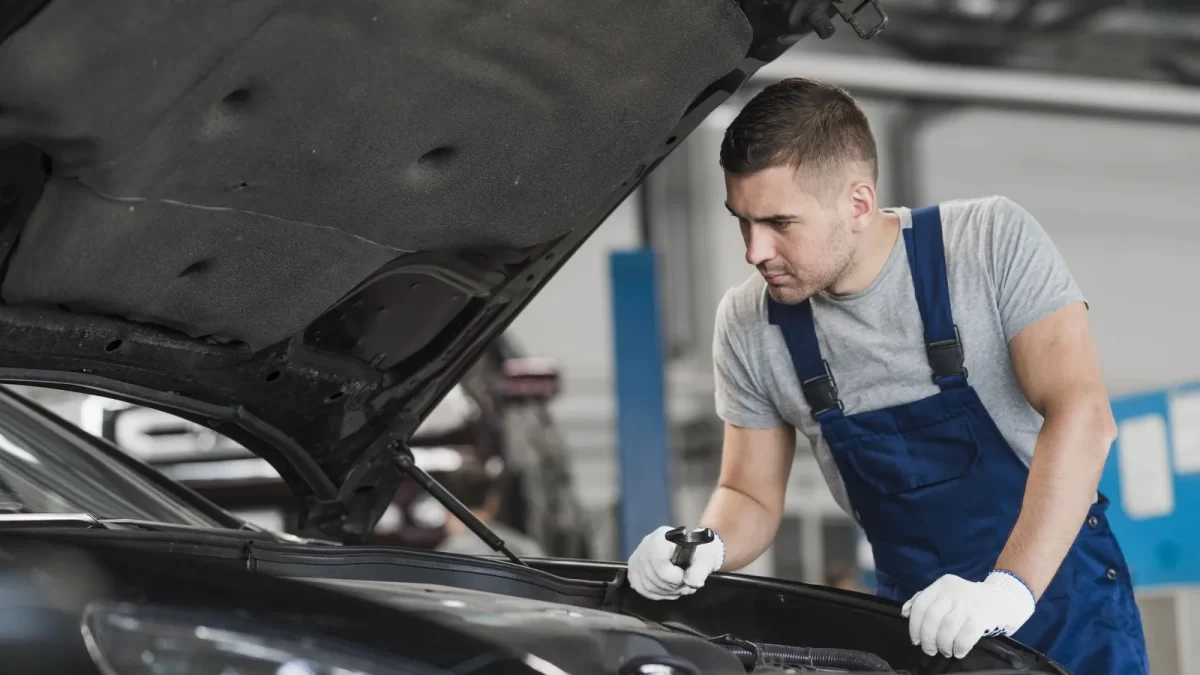 Car repair shop composition with mechanic tools
