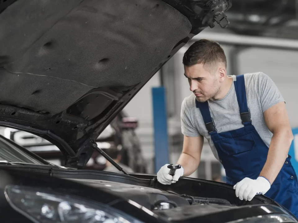 Car repair shop composition with mechanic tools
